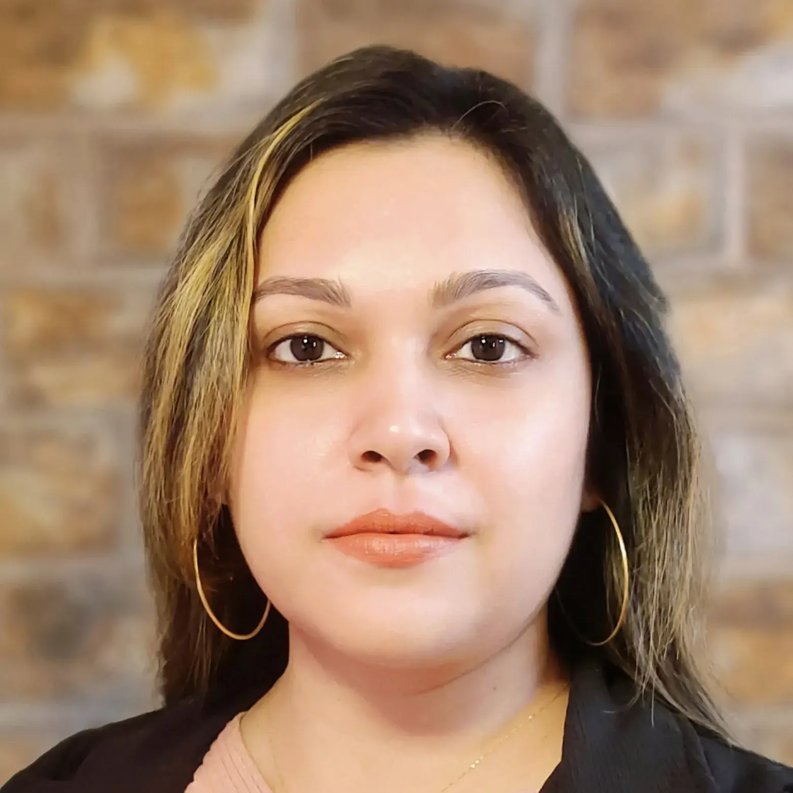 A professional headshot of a woman recognized as a Woman of the Future Emerging Tech.